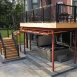 Aerial overview of Wasaga Beach property showing pool, deck, fire pit, and walkways