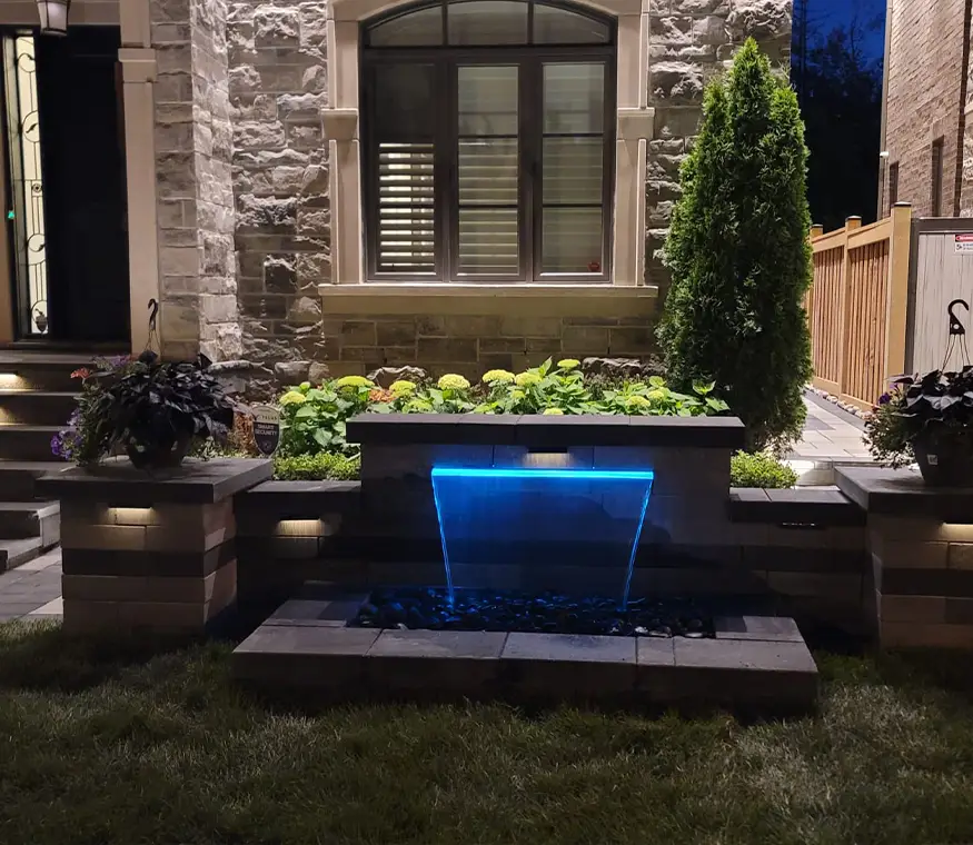 Front walkway and steps with interlock paving and stone accents