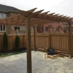 Custom backyard deck built by professional landscape contractor