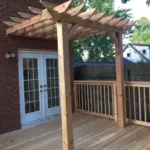 Custom pergola added to deck by deck contractor