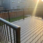 Deck pergola addition improving outdoor comfort