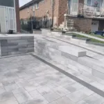 Landscape wall design built with interlocking stone