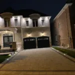 Outdoor lighting integrated into patio and walkway design