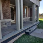 Residential flagstone stonework by landscape contractor