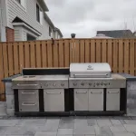 Stone BBQ and outdoor kitchen feature by interlocking stone contractor